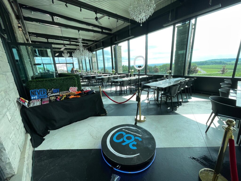 360 video booth with stanchions and props.