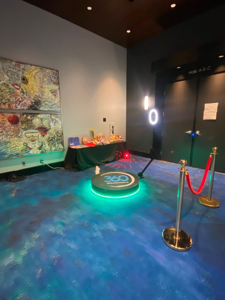 360 video booth with stanchions and props